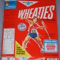 1977 Bruce Jenner (throwing javalin) (jogging outfit offer on front)